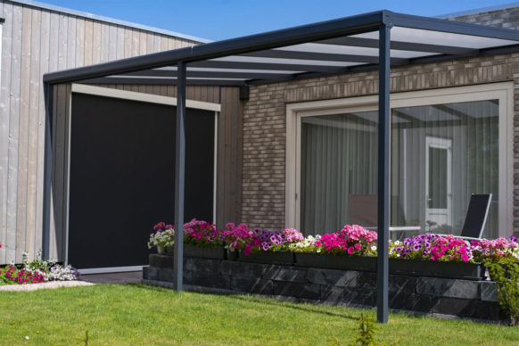 Aluminum pergola attached to house