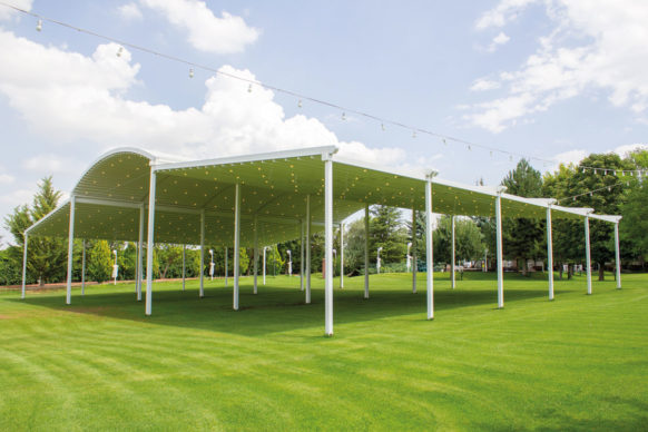 Freestanding Pergola with retractable canopy and curved roof